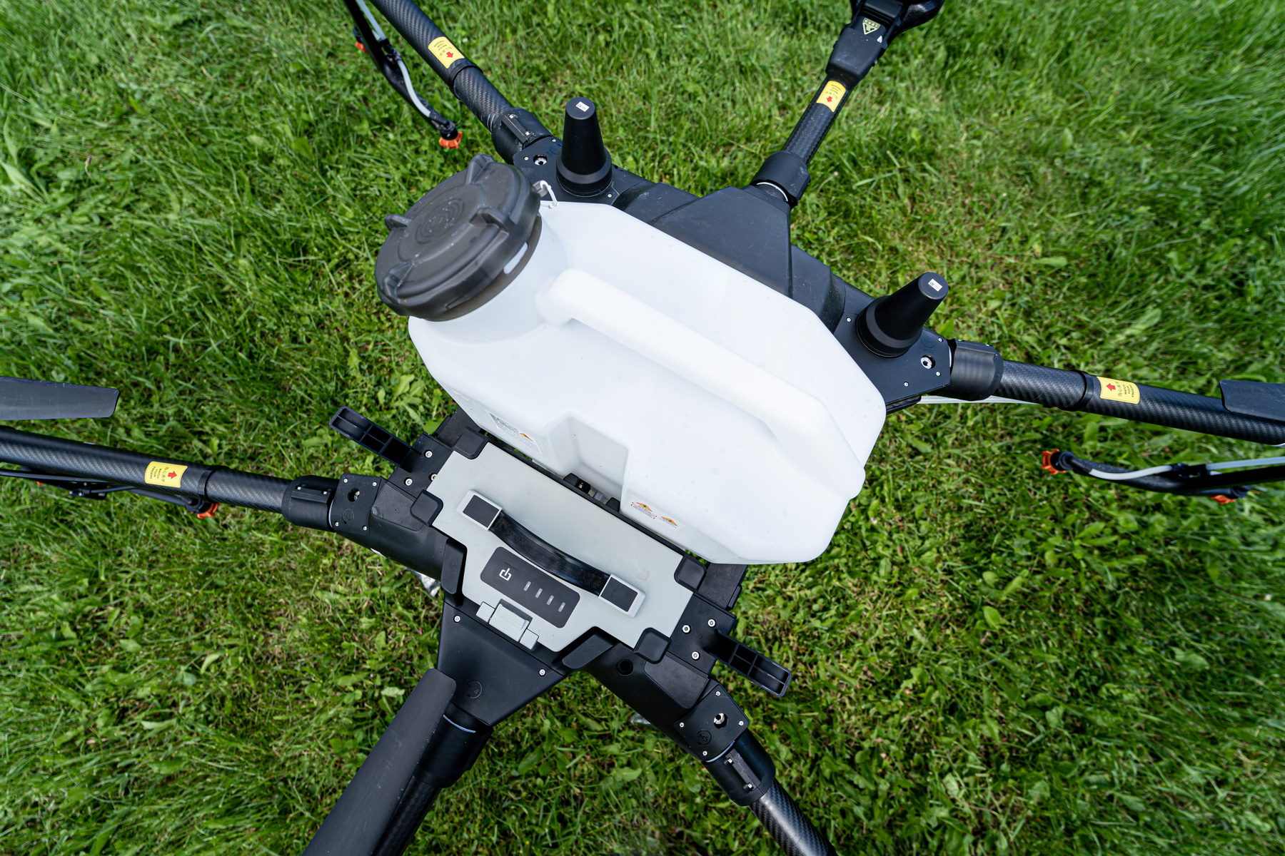 Professional agriculture drone on the green field